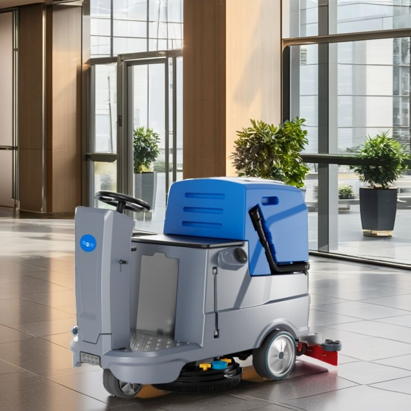 Ride on scrubber machine